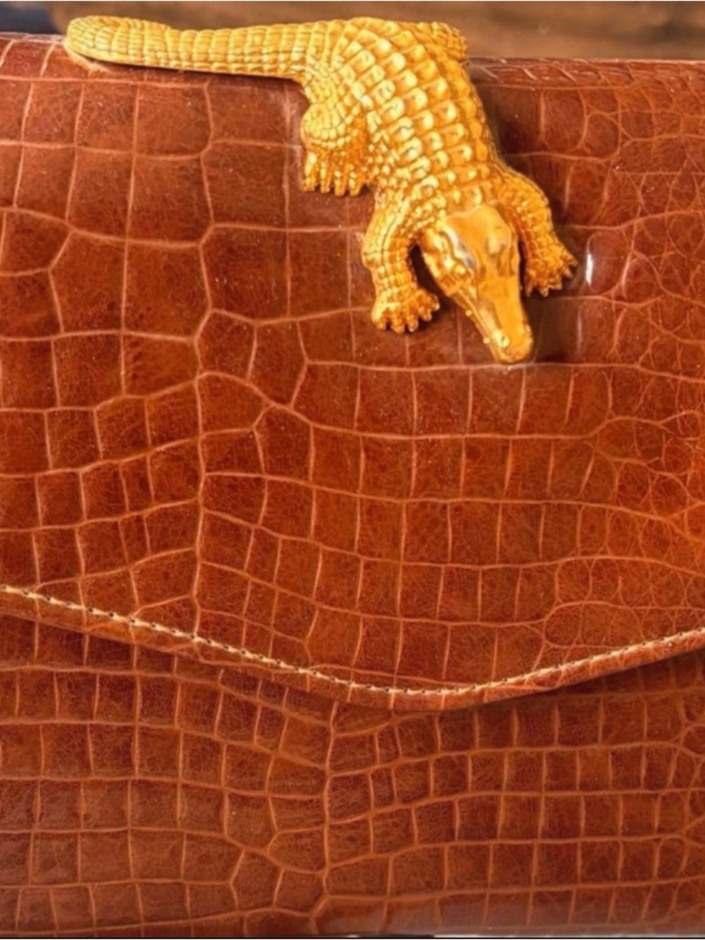 Cognac Croc-Embossed Leather Clutch with Gold Crocodile Accent